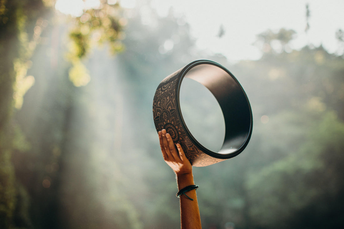 Bending, Stretching, and Balancing with the Yoga Infinity Wheel - Yoga Design Lab 